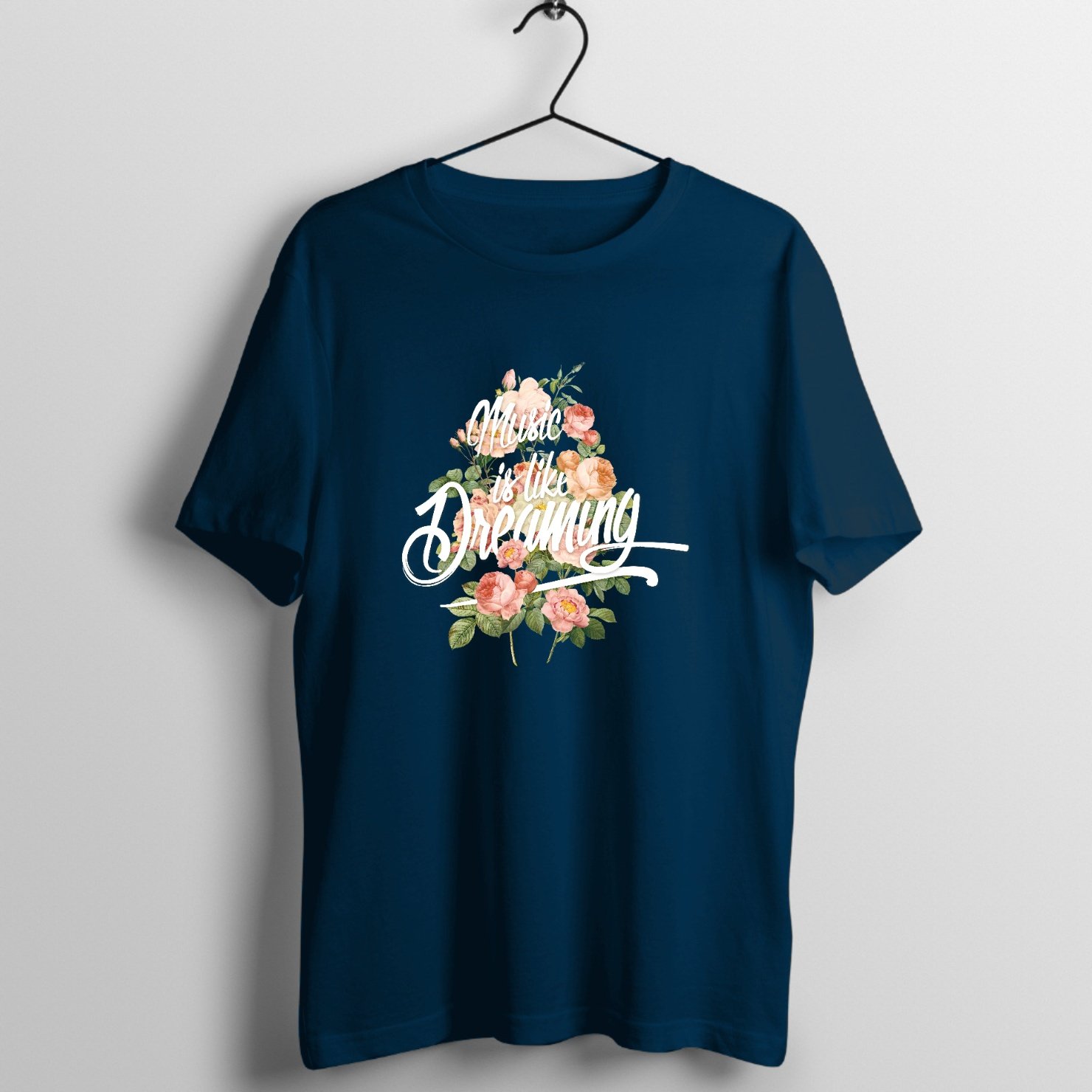 Watercolor pink roses and green leaves with 'Music is like Dreaming' script text printed on premium rock music graphic t-shirt - Front Mockup